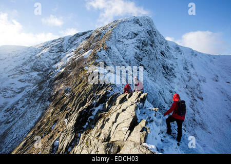 Winter scrambling on Helvellyn and Blencathra in the Lake District National Park, Cumbria, UK Stock Photo