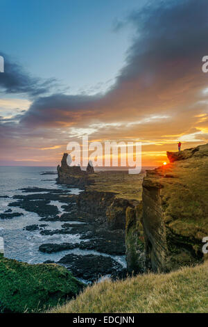 Londrangar sea stacks and the Thufubjarg cliffs. Snaefellnes Peninsula, Iceland Stock Photo