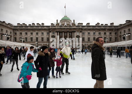 Skating at Somerset House on the Strand in London UK Stock Photo