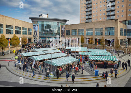 Salford Quays Lowry Outlet Mall  with a market outside Stock Photo