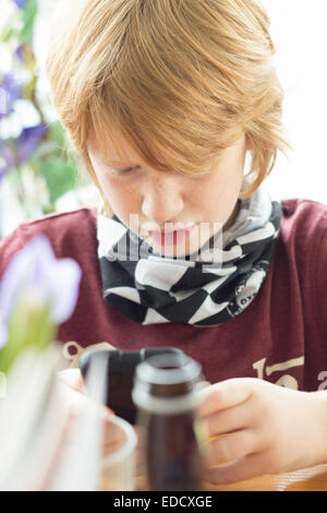 boy playing game ipod Stock Photo