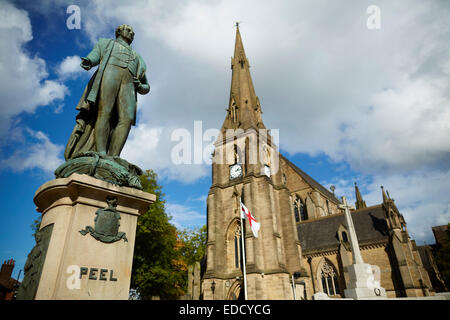 Sir Robert Peel Statue in bury Lancashire UK. The Peel Memorial next to St. Mary the Virgin church Stock Photo