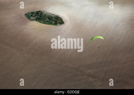 A paraglider gliding in Algodonales, Andalucia, Spain, near the landing field. Stock Photo