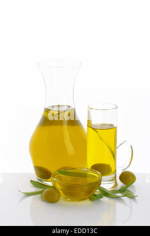 Olive oil in clear glass serving vessels Stock Photo