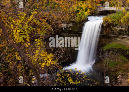 Minnehaha Falls surrounded by autumn colors. Stock Photo