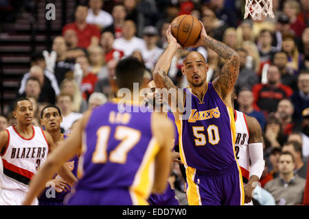 Portland, Oregon, USA. 5th Jan, 2015. ROBERT SACRE (50) looks to pass the ball. The Portland Trail Blazers play the Los Angeles Lakers at the Moda Center on January 5, 2014. Credit:  David Blair/ZUMA Wire/Alamy Live News Stock Photo