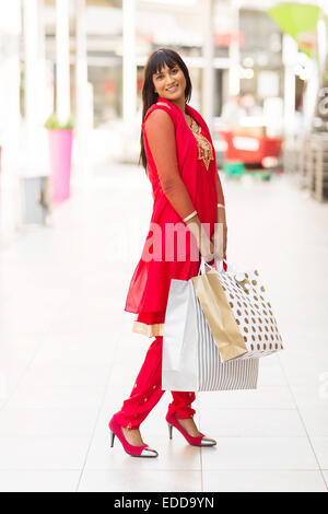 joyful Indian girl in shopping center Stock Photo