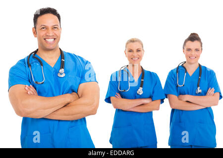 happy middle aged doctor with medical team on background Stock Photo