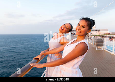 cheerful two women having fun on cruise ship Stock Photo
