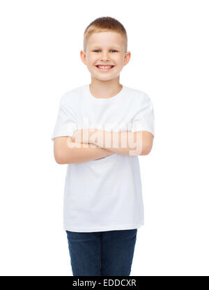 little boy in white t-shirt with arms crossed Stock Photo