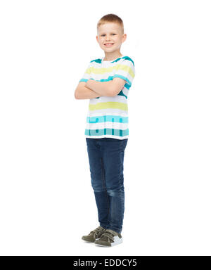 little boy in casual clothes with arms crossed Stock Photo