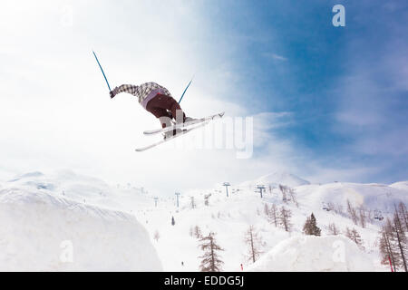 Free style skier performing a high jump Stock Photo