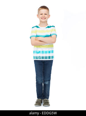 little boy in casual clothes with arms crossed Stock Photo