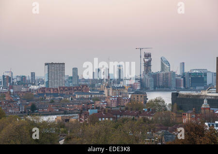 Skyline of eastern London at dusk. View from Greenwich Hill. Stock Photo