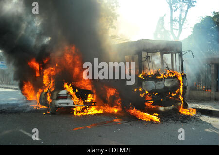 Dhaka, Bangladesh. 6th January, 2015. At least six vehicles were set on fire in Dhaka on the first day of the countrywide non-stop blockade program enforced by the BNP-led 20-party alliance. Credit:  Mamunur Rashid/Alamy Live News Stock Photo