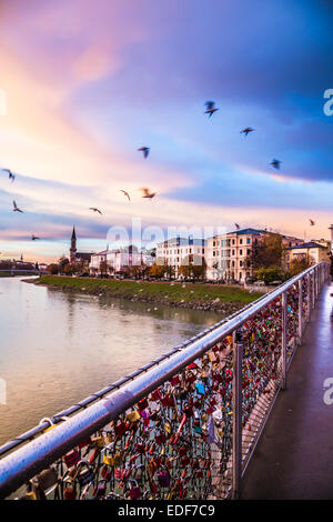 Padlocks of love on a bridge on Salzach River, Salzburg, Austria Stock Photo