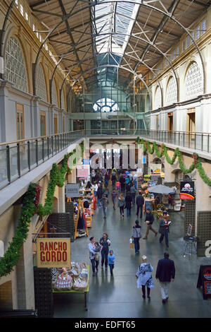 Interior view of the historic Ferry Building with various food produce shops and stalls Embarcadero San Francisco California USA Stock Photo