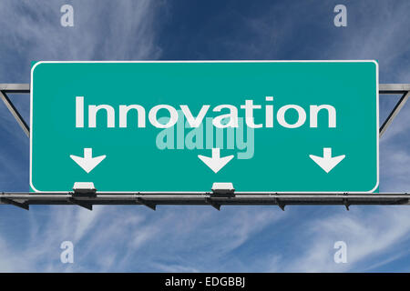 Freeway to innovation road sign with cirrus clouds. Stock Photo