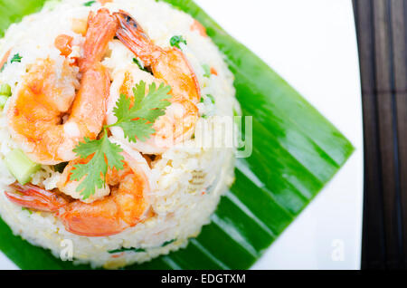 Thai food mixed seafood fired rice on banana leaf 'Khao Pad' Stock Photo