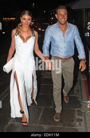 The Only Way Is Essex (TOWIE) stars Chloe Sims and Elliott Wright arrive at Nobu London  Featuring: Elliott Wright,Chloe Sims Where: London, United Kingdom When: 04 Jul 2014 Stock Photo