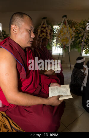 Tibetan monks, mourners, praying, Vietnamese funeral, memorial service, Little Saigon, city of Westminster, California, Stock Photo