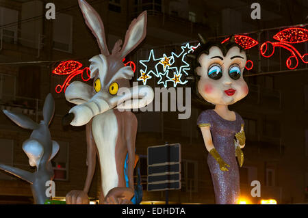 Bettty Boop and Coyote in the cavalcade of the Magi on the float gifts. Stock Photo