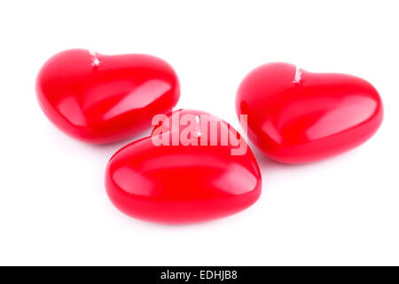Red heart candles isolated on white background. Stock Photo