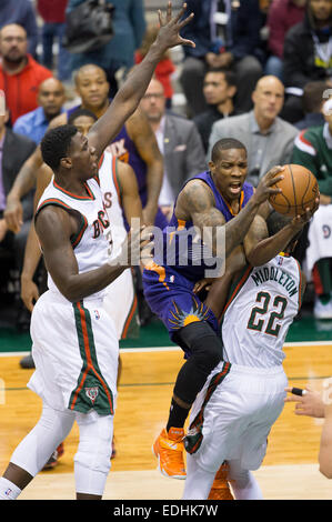 Milwaukee, WI, USA. 6th Jan, 2015. Milwaukee Bucks forward Khris Middleton (22) takes a charge during the NBA game between the Phoenix Suns and the Milwaukee Bucks at the BMO Harris Bradley Center in Milwaukee, WI. Suns defeated the Bucks 102-96. John Fisher/CSM/Alamy Live News Stock Photo