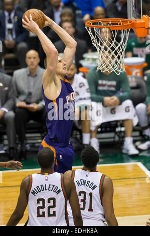 Milwaukee, WI, USA. 6th Jan, 2015. Phoenix Suns center Alex Len (21) goes in for a dunk during the NBA game between the Phoenix Suns and the Milwaukee Bucks at the BMO Harris Bradley Center in Milwaukee, WI. Suns defeated the Bucks 102-96. John Fisher/CSM/Alamy Live News Stock Photo