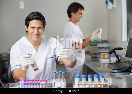 Researchers Analyzing Samples In Lab Stock Photo