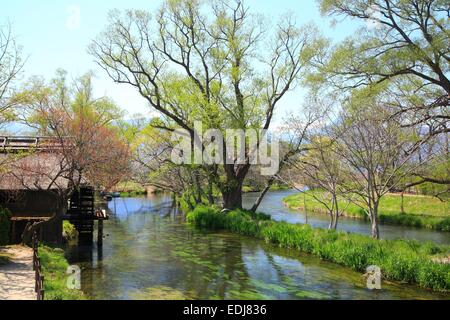 Water mill and river, Azumino, Nagano, Japan Stock Photo