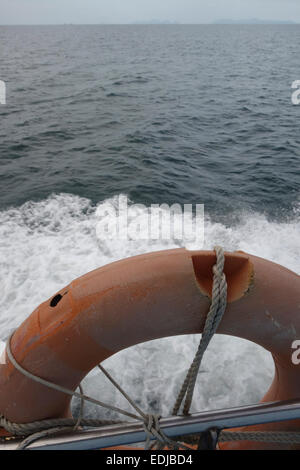 Buoy round lifesaver on ferry boat, Thailand, Southeast Asia. Stock Photo