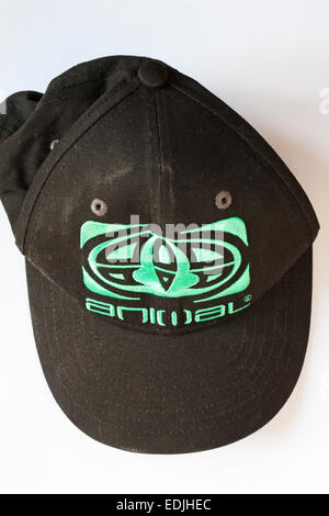 Animal black baseball cap with green writing and logo isolated on white background Stock Photo