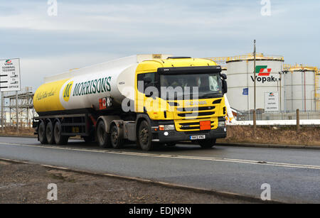 Seal Sands Oil Terminal, Teesside, UK. 7th January 2015. A petrol tanker leaves the Vopak Terminal at Seal Sands on Teesside to distribute petrol to a network of petrol stations across the UK. Brent crude oil has hit its lowest price since May 2009 and has fallen below $50 per barrel. Stock Photo