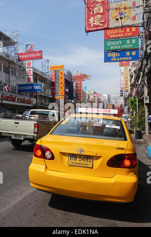 Yellow Taxi-meter taxi in Chinatown at Yaowarat Road. Bangkok. Thailand. Southeast asia. Stock Photo