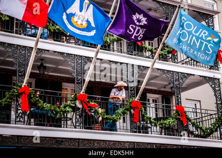 The Balconly of the Sheraton Four Points Hotel on Bourbon Street in New Orleans LA Stock Photo