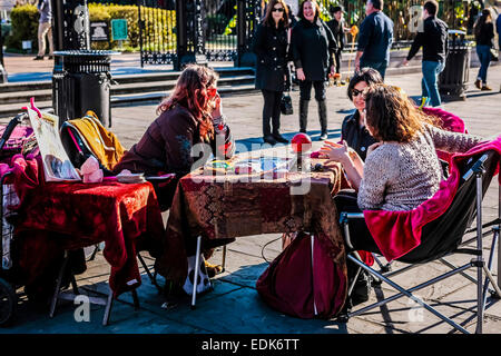 Fortune tellers offer in insight into the futre to passersby in Chartres St nearJackson Square in New Orleans LA Stock Photo