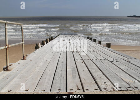 Wooden ramp for  launching boats into sea, Walton-on-the Naze, Essex Stock Photo