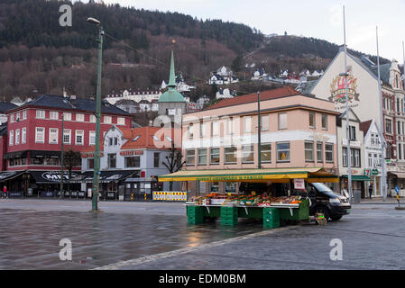 A Solitary Fruit Market Stall in Torget Central Bergen on a Cold January Morning with Floyen in the Background Norway Stock Photo