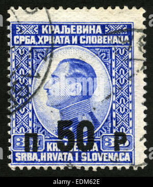 Yugoslavia circa 1926, Kingdom of SHS,Stamp from the former Yugoslavia honoring King Alexander, with surcharge for flood relief Stock Photo