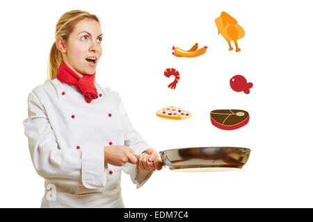 Surprised female cook turning illustrated food in a frying pan Stock Photo