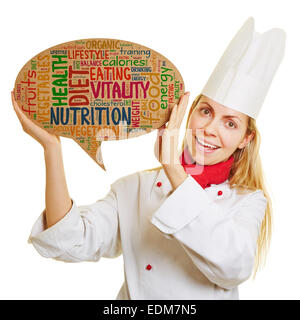 Smiling chef cook with concept for healty diet and nutrition in a speech bubble Stock Photo