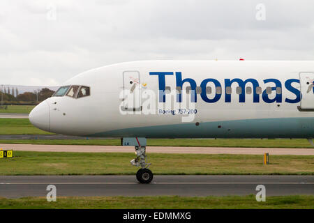 Thomas Cook Boeing 757, taxiing at Manchester International Airport. Stock Photo