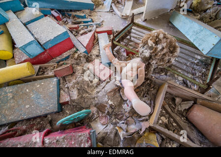 Stuffed plush toys and dolls, Cheburashka on a shelf in a closet in a  destroyed kindergarten in Pripyat, in the Chernobyl exclusion zone, Ukraine  Stock Photo - Alamy