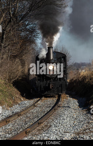 A steam locomotive from the Strasburg Rail Road chugs through Lancaster County, PA. Stock Photo