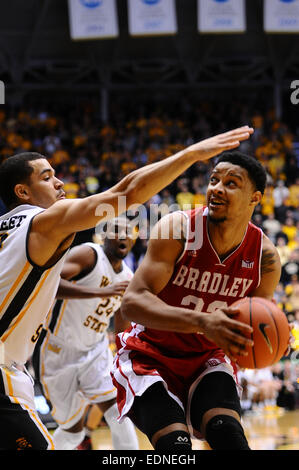 Wichita, Kansas, USA. 07th Jan, 2015. Bradley Braves forward Xzavier Taylor (22) drives to the basket during the NCAA Basketball game between the Bradley Braves and the Wichita State Shockers at Charles Koch Arena in Wichita, Kansas. Kendall Shaw/CSM/Alamy Live News Stock Photo