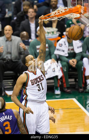 Milwaukee, WI, USA. 6th Jan, 2015. Milwaukee Bucks center John Henson (31) scores on a dunk during the NBA game between the Phoenix Suns and the Milwaukee Bucks at the BMO Harris Bradley Center in Milwaukee, WI. Suns defeated the Bucks 102-96. John Fisher/CSM/Alamy Live News Stock Photo