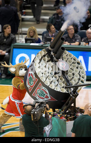 Milwaukee, WI, USA. 6th Jan, 2015. Bango shoots t-shirts into the crowd during the NBA game between the Phoenix Suns and the Milwaukee Bucks at the BMO Harris Bradley Center in Milwaukee, WI. Suns defeated the Bucks 102-96. John Fisher/CSM/Alamy Live News Stock Photo