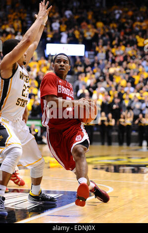 Wichita, Kansas, USA. 07th Jan, 2015. Bradley Braves guard Tramique Sutherland (5) drives to the basket during the NCAA Basketball game between the Bradley Braves and the Wichita State Shockers at Charles Koch Arena in Wichita, Kansas. Kendall Shaw/CSM/Alamy Live News Stock Photo