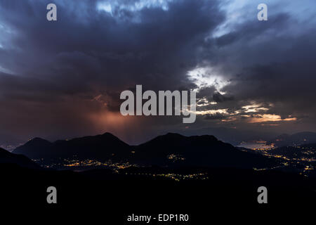 Rain and storm formation over the Maggiore Lake and mountains, Varese Stock Photo